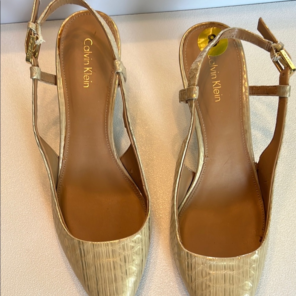 Calvin Klein Gold Sandals with Slingback Design